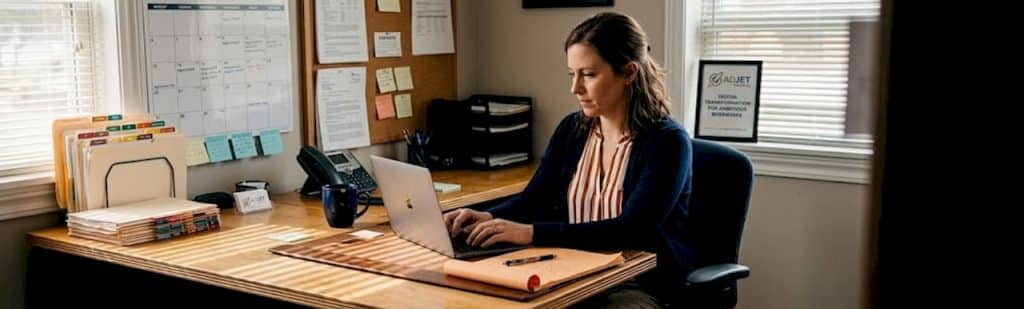 Clinic manager working on digital marketing tasks