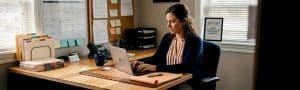 Clinic manager working on digital marketing tasks