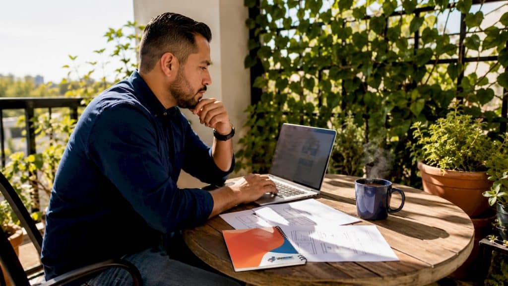Marketer reviewing real estate landing page designs