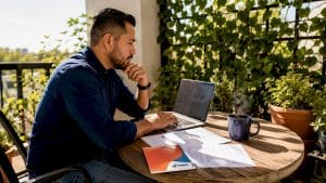 Marketer reviewing real estate landing page designs
