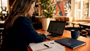 Clinic manager working on website optimization at desk