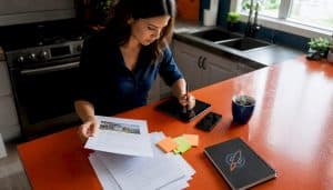 Realtor at desk managing online reputation