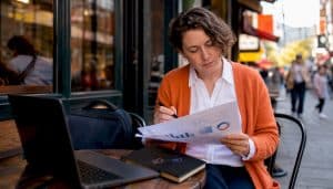 Psychiatrist working on SEO strategy at home desk
