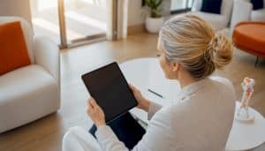 Marketing specialist adjusting digital ads setup tablet