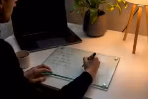 Therapist desk with Google Ads setup notes