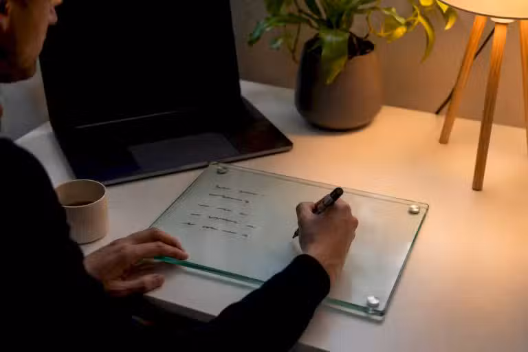 Therapist desk with Google Ads setup notes