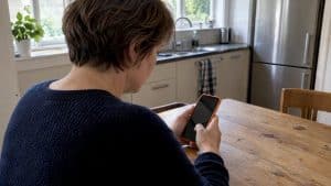 Patient booking a clinic appointment on smartphone