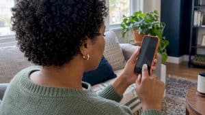 Patient tapping a medical practice call button